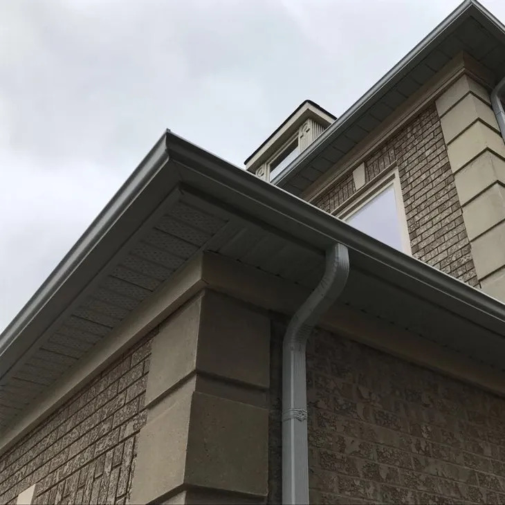 house with newly installed gutters