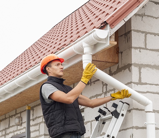 gutters being installed